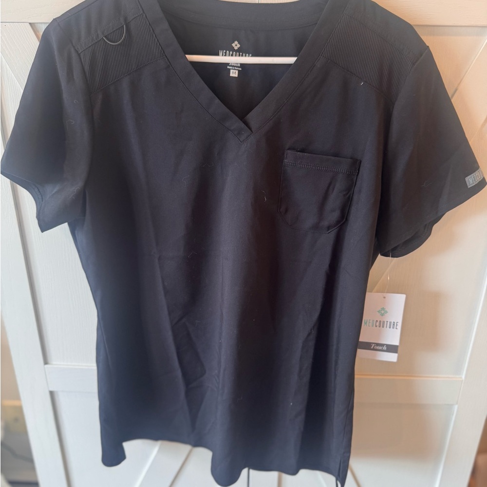 V-Neck Black Medical scrub top - women’s size Medium very soft fabric.